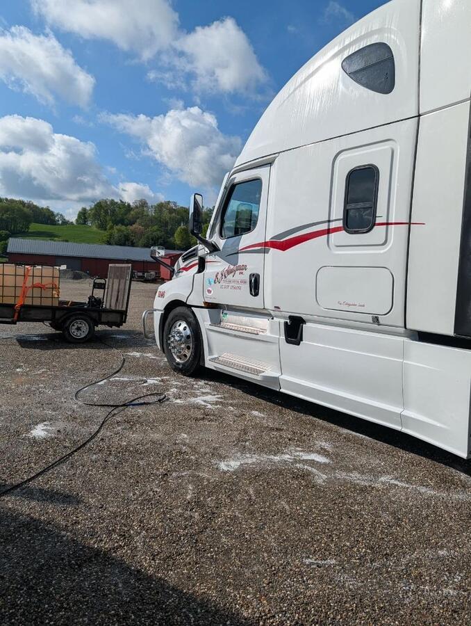 Clean white semi-truck after professional washing